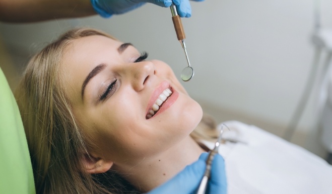 Young woman receiving a preventive dental checkup